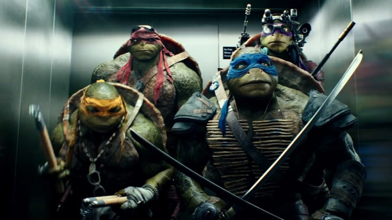 Ninja Turtles riding an elevator