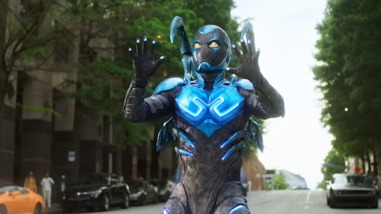 Blue Beetle putting up hands