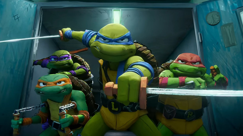 Ninja Turtles posing with weapons