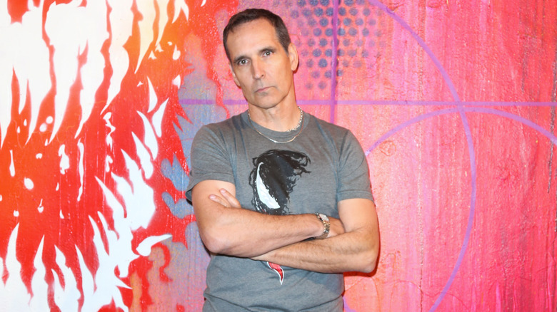 Todd McFarlane wearing a Venom shirt