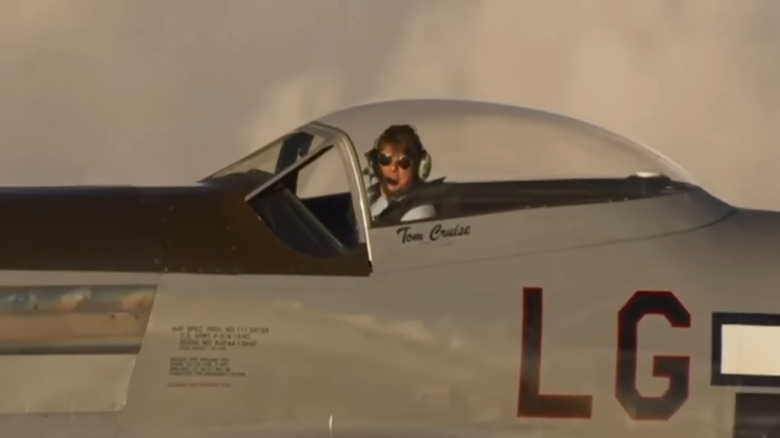 Tom Cruise flying a plane