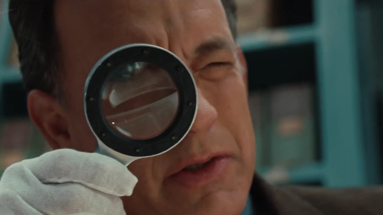 Tom Hanks with magnifying glass