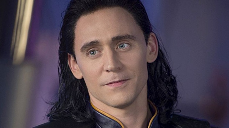 Tom Hiddleston Loki smiling long hair