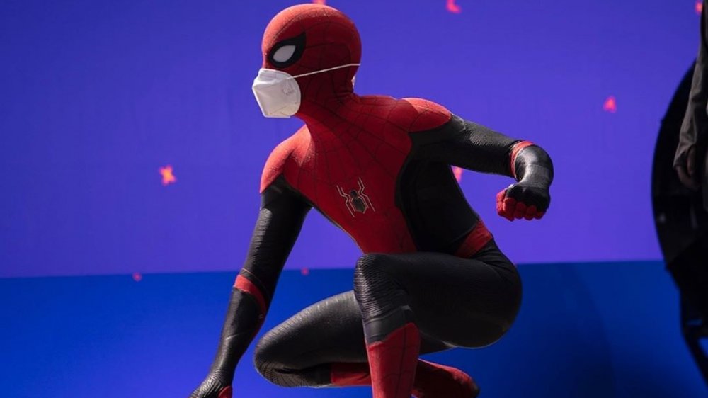 A behind-the-scenes photo of Tom Holland as Spider-Man