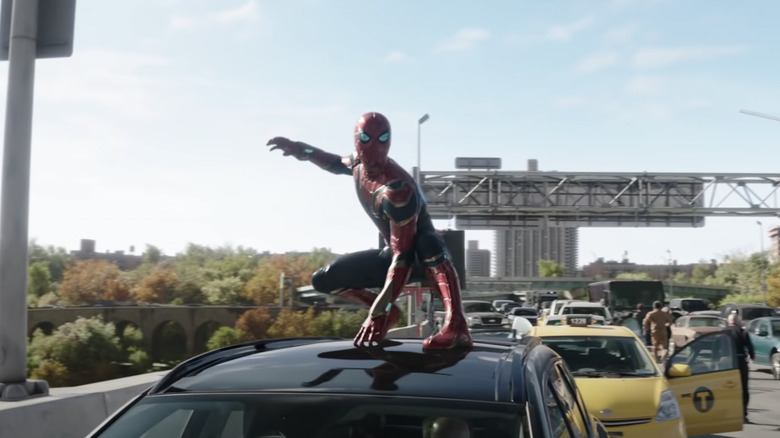 Spider-Man on top of car in "No Way Home" trailer