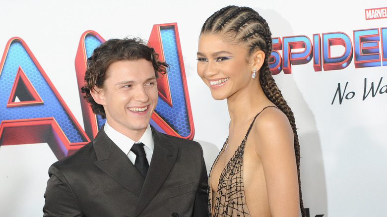 Tom Holland and Zendaya smiling together