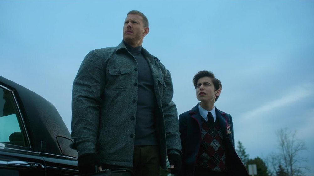 Tom Hopper as Luther and Aidan Gallagher as Number Five in The Umbrella Academy