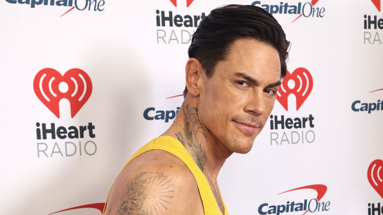 Tom Sandoval yellow tank top