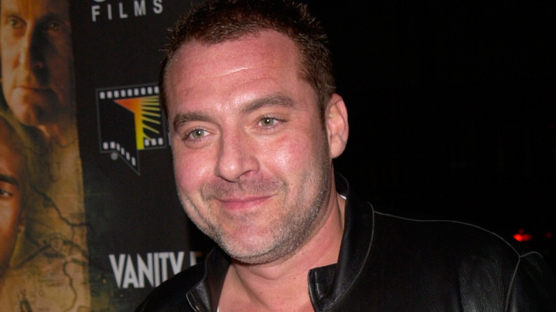 Younger Tom Sizemore smiling 