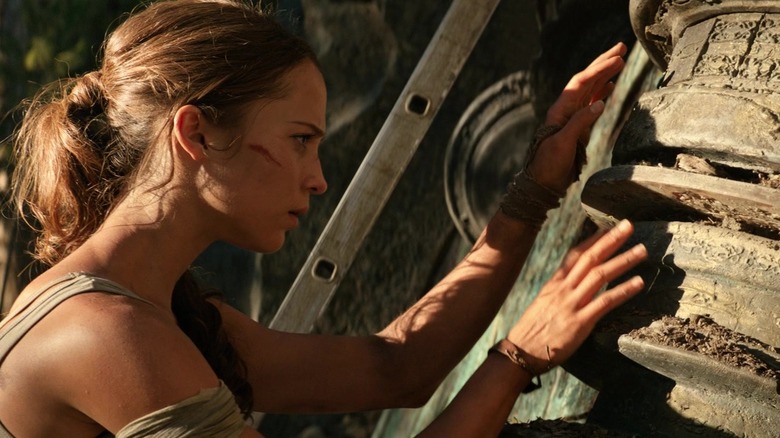Lara Croft solves puzzle