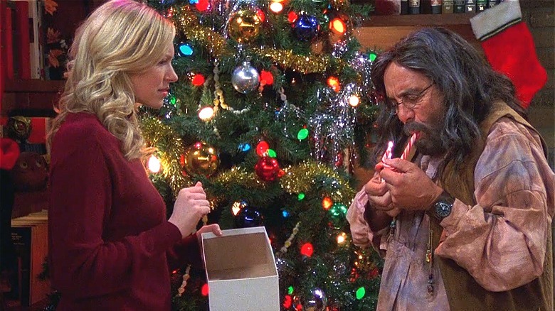 Leo attempts to smoke a candy cane in That '70s Show 