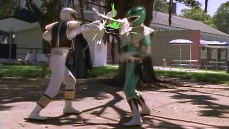 Green Ranger fighting White Ranger