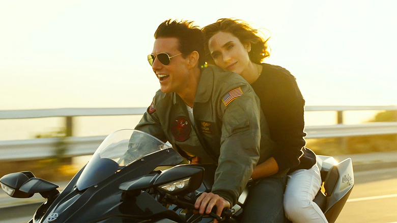 Maverick and Penny riding on a motorcycle