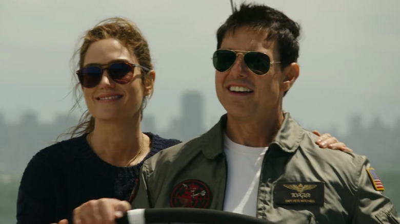 Penny and Maverick sailing a boat in Top Gun: Maverick