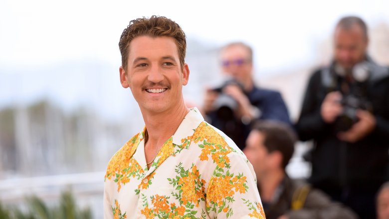 Miles Teller in a floral shirt