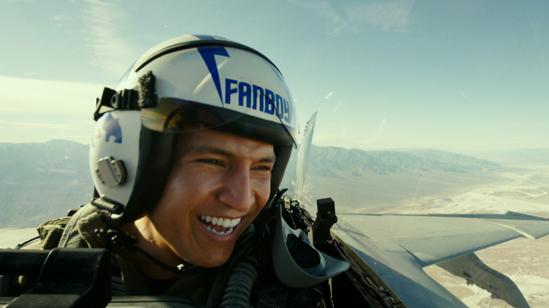 Fanboy soaring above mountains