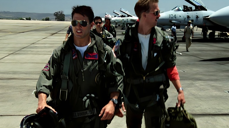 Maverick and Goose wearing flight gear