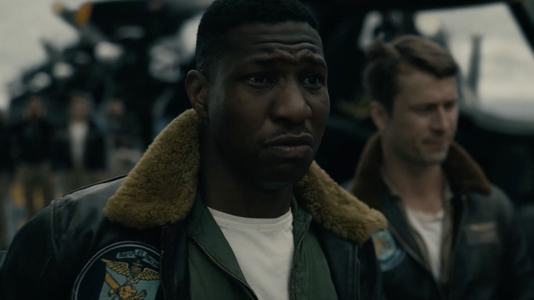 Jesse Brown wearing a flight jacket