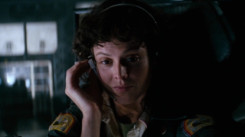 Ripley wearing headset