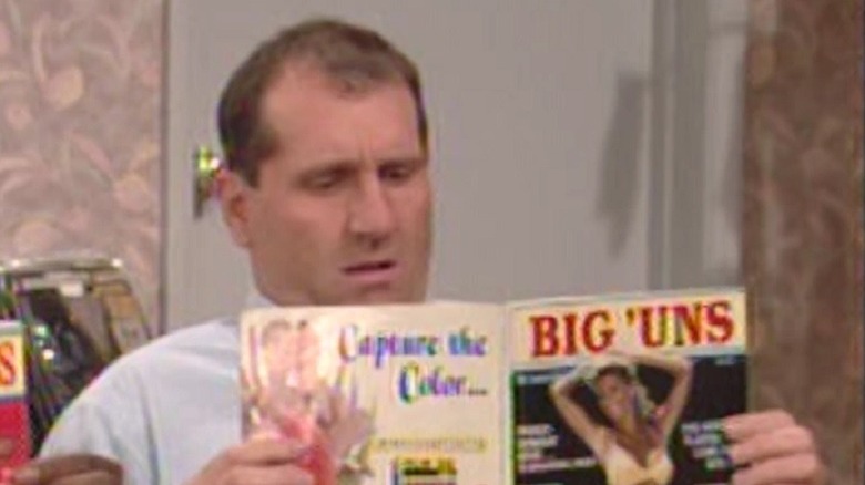 Al Bundy reading a dirty magazine