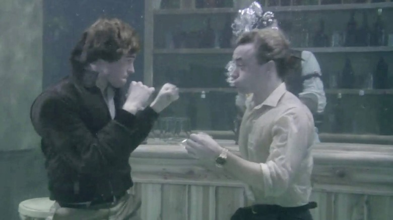 Val Kilmer and Christopher Villiers fight underwater in Top Secret!