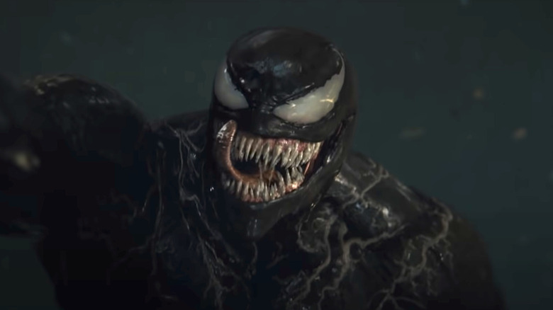 Venom prepares to eat a human