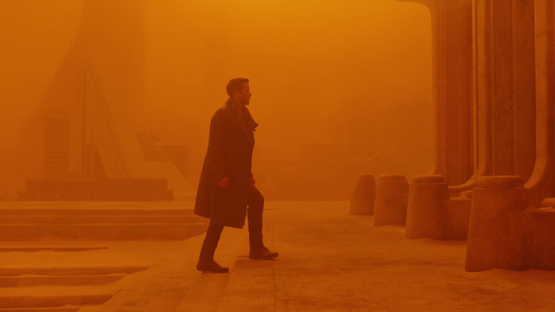 Ryan Gosling in orange abandoned city