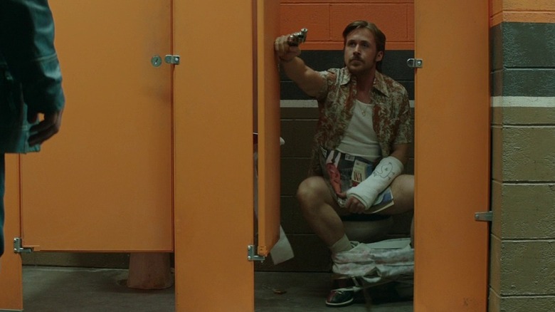 Ryan Gosling in bathroom stall