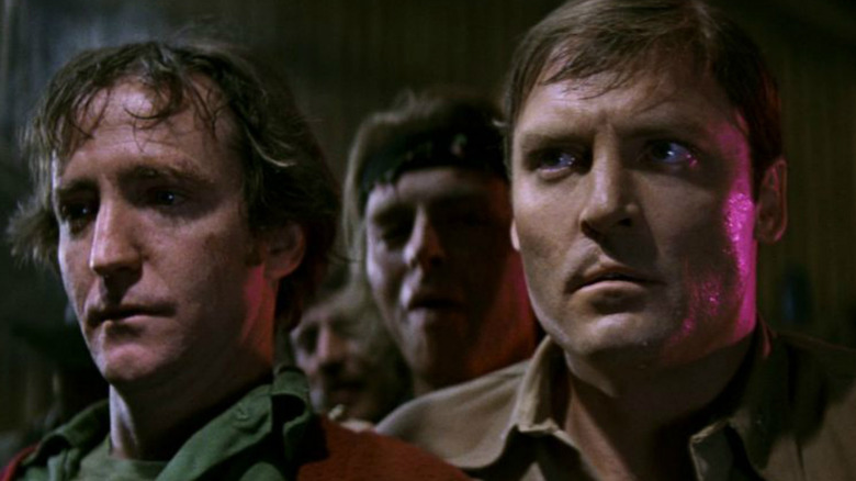 Stacey Keach and Scott Wilson glance nervously