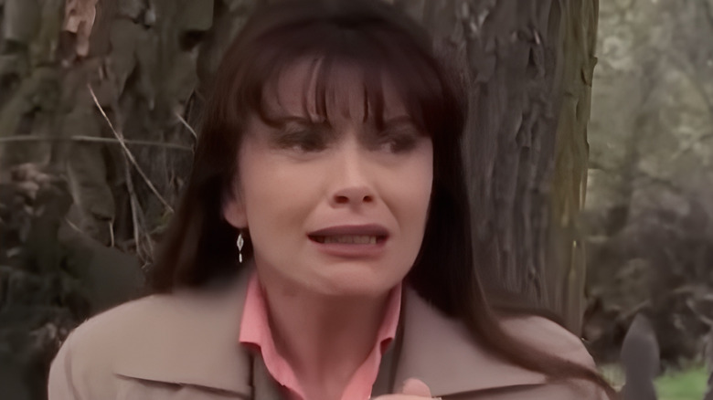 Monica crying in woods