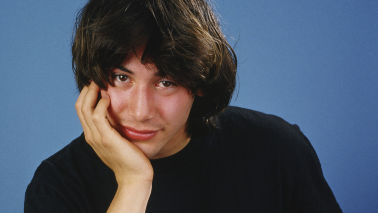 Young Keanu Reeves posing