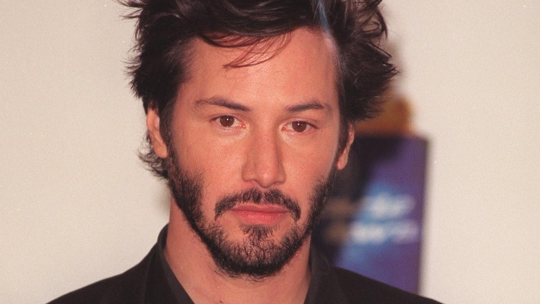 Keanu Reeves with tousled hair