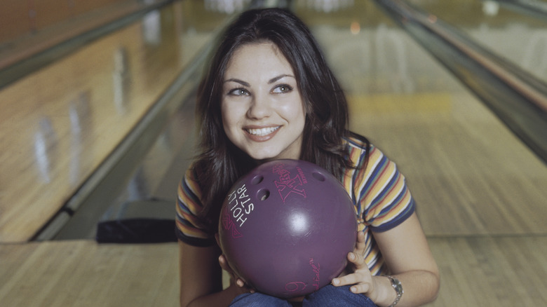 Mila Kunis at bowling alley