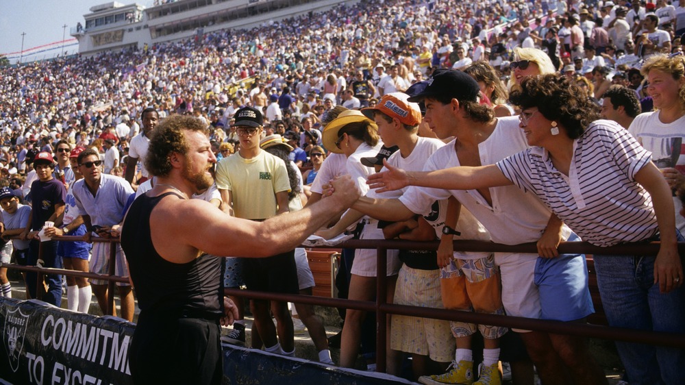 John Matuszak signing autographs