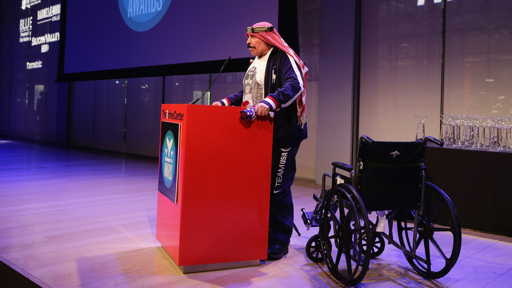 Iron Sheik next to wheelchair