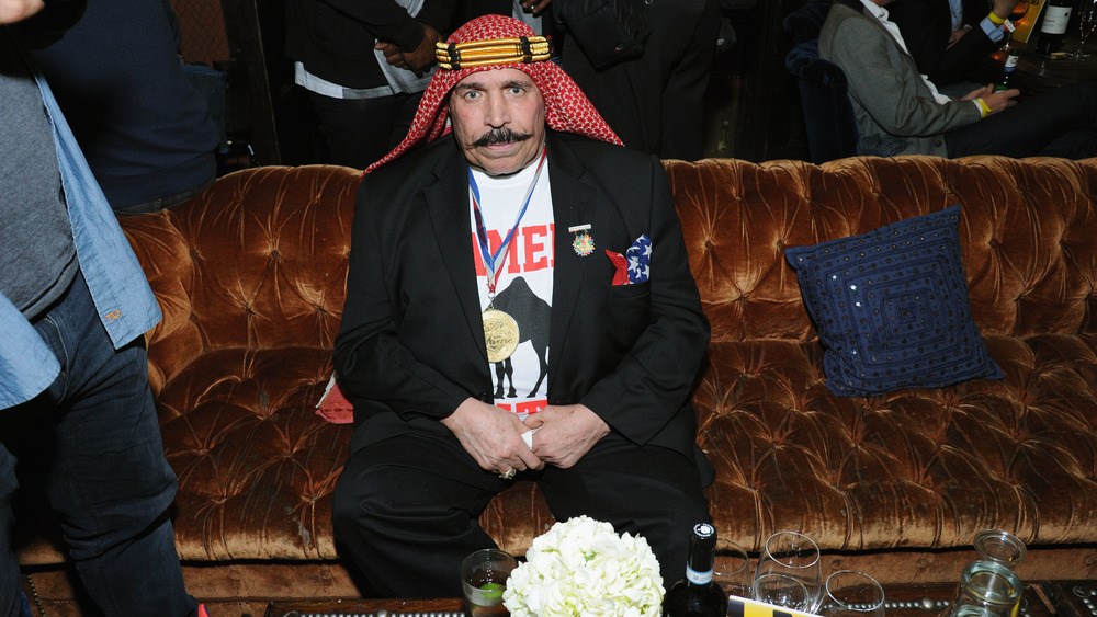 Iron Sheik sitting