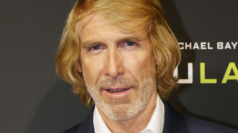 Michael Bay smiling on red carpet