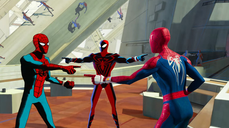 Spider-Men pointing at each other