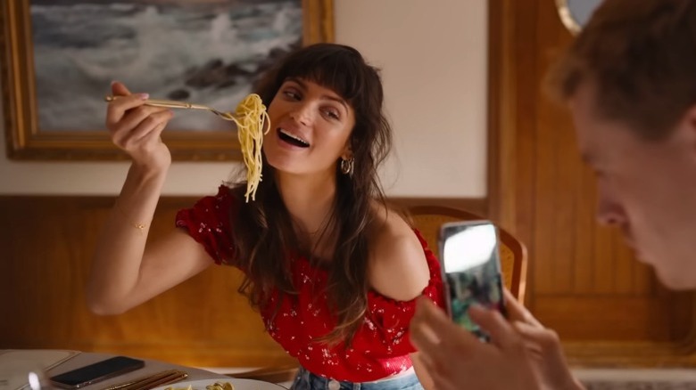 Yaya posing for photo with spaghetti