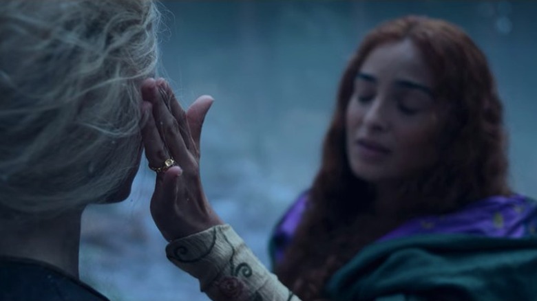 Triss touching Ciri's face