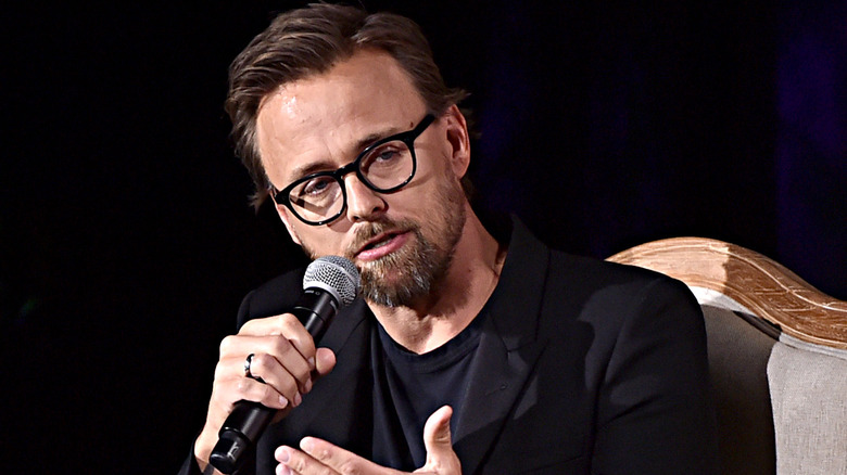 Joachim ﻿Rønning speaking into microphone