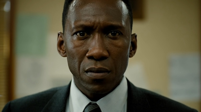 Mahershala Ali staring