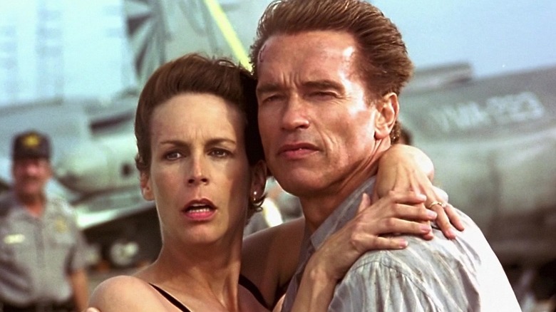 Jamie Lee Curtis and Arnold Schwarzenegger embrace