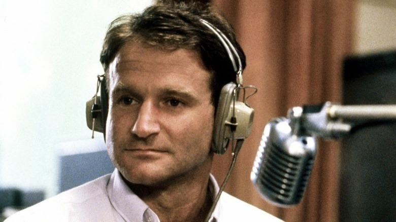 Adrian Cronauer wearing headphones