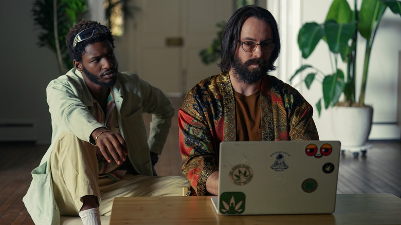 Tyson and Bodhi looking at a computer