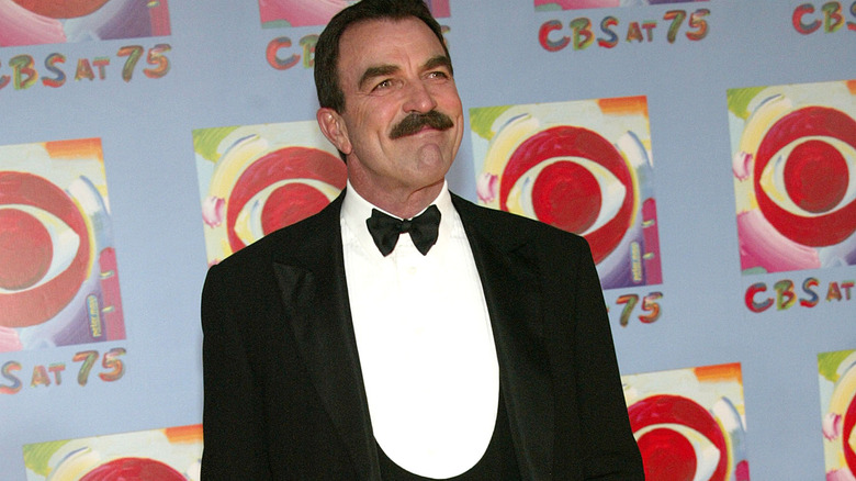 Tom Selleck in front of CBS wall