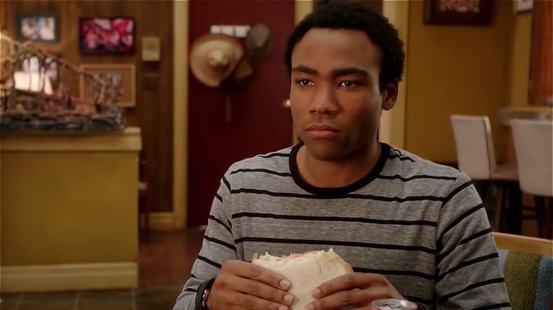 Troy eating a sandwich