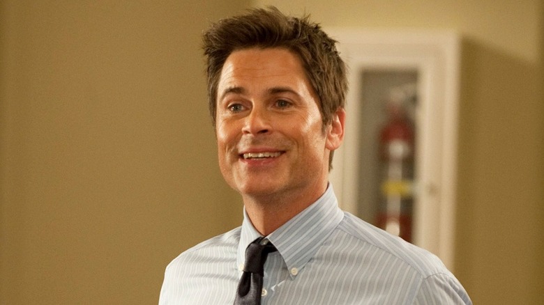 Chris Traeger smiles happily