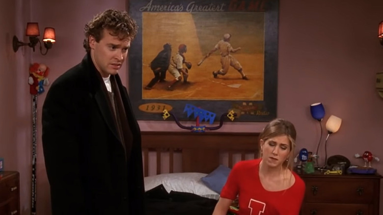 Tate Donovan and Jennifer Aniston in bedroom