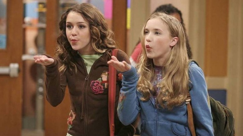 Miley and Lilly blow kisses together on "Hannah Montana"